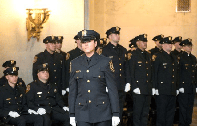 Photo of Kristen in her police uniform.