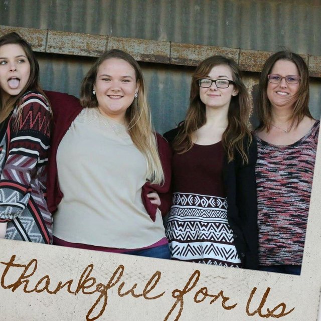 Photo of Laura, her younger sister Alexis (left), her older sister Leah (right), and her mother Amy (far right)