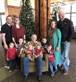 Lee Goggin in a photo with members of his family.