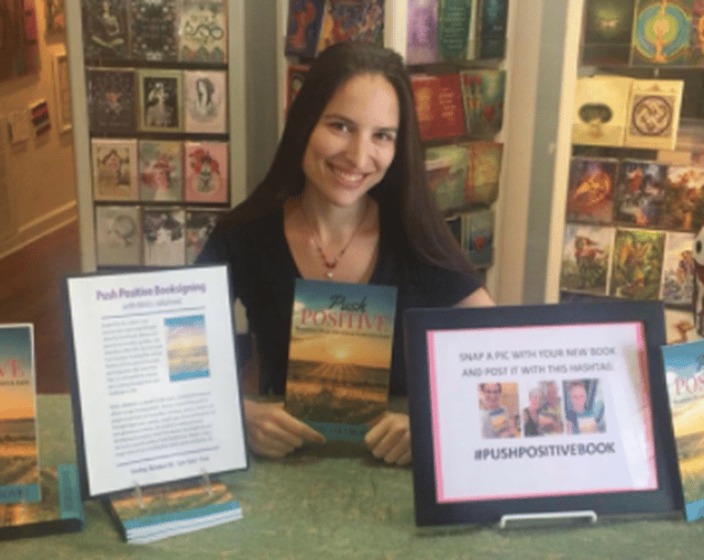 Meliss with her book My Vision Journal