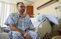 Photo of Michael Diebold while inside of the hospital room.