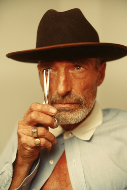 A man holding scissors