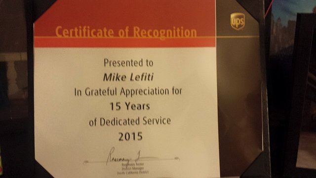 Photo of Mikes' 15 years of service award from UPS