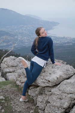 Leaning up against rocks