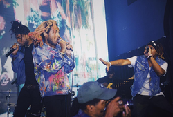 Photo of Minus Gravity performing live.