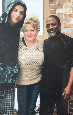 Photo of Nickolas Vinson with his parents.
