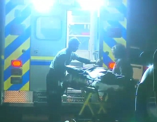 Yesenia Funez Beatriz Machado's body being taken away in an ambulance