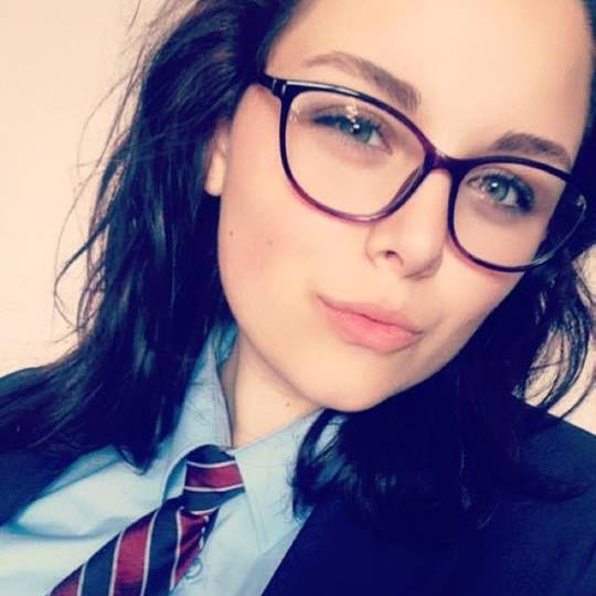 Olivia wearing glasses