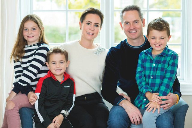 Pat MicGann with his wife and children