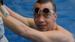 Photo of Patrick Roland Martin swimming.