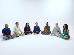 Peter Oppermann guiding a meditation with other practitioners.