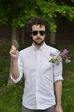 Van Valkenburgh holding a rock