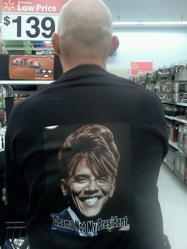 Photo of Wade wearing his Anti Obama shirt.