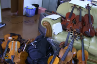 Photo of some of the violins destroyed by Qin Yue