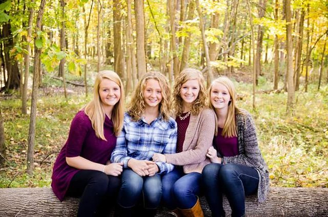 With her sisters