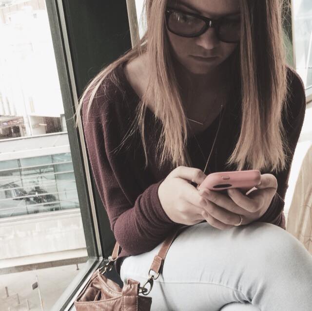 On her phone