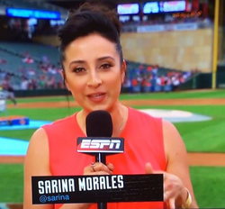 Sarina Morales reporting on Prince Night at a Minnesota Twins game.