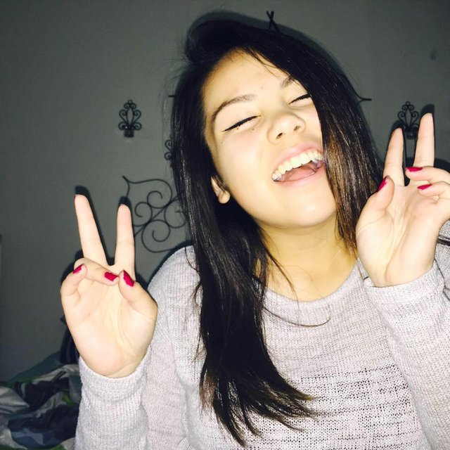 Showing Peace Signs