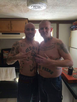 Photo of Shawn White (left) and a friend with white supremacist tattoos