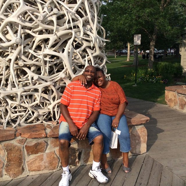 Photo of Shelia and her husband Pharrell Burage at a park