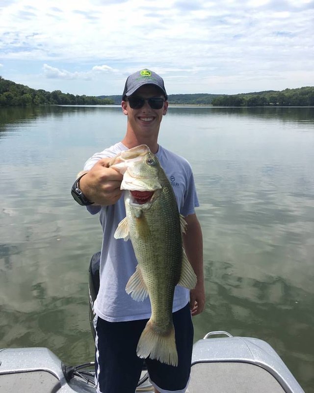 Spencer Nicodemus showing off his catch