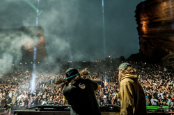 Squnto and Boogie T going B2B at Red Rocks. He is wearing a Dipitus shirt.