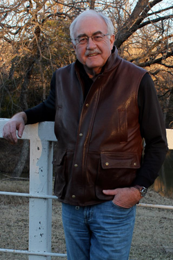 Leaning against a fence