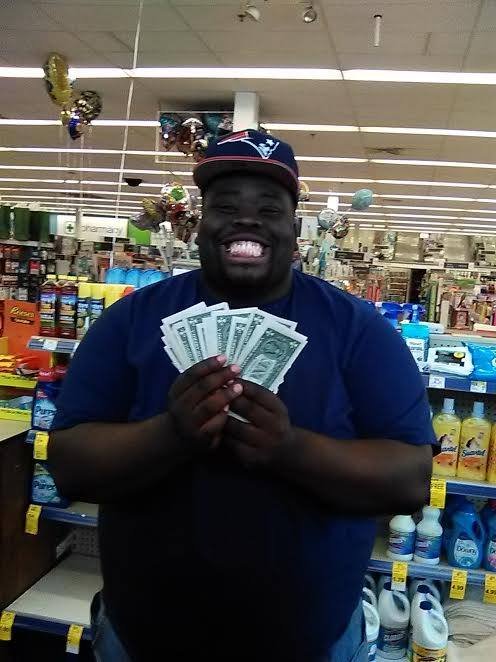 Photo of Steve holding money