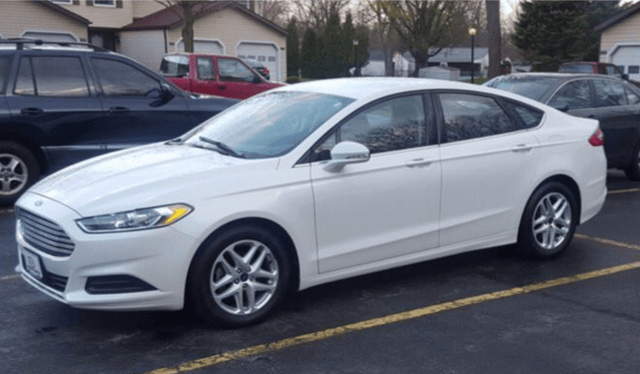 Steve Stephens' white 2013-2017 Ford Fusion; it has temporary tags with the plate number E3636330