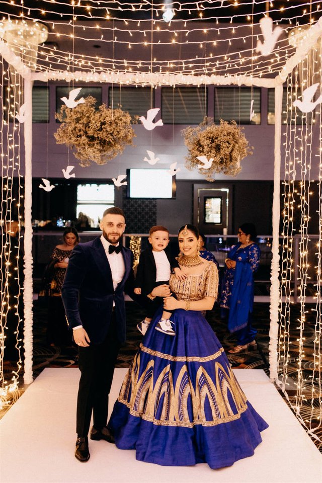 Tannu Kaur Gill with husband Mandy Gill and their son Zavier Gill.