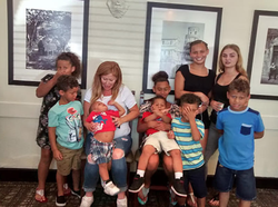 Photo of Tasha Schleicher with most of her children.