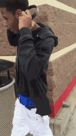 Kicking the person from behind