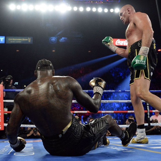 Wilder knocked down twice