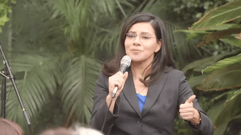 Vanessa Aramayo speaking at a campaign event