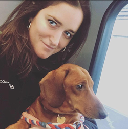 A photo of Violet Westenholz with her dog.