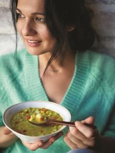 Whitney eating a soup