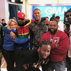 Photo of Bar-Son Jones with members of Wu-Tang Clan.